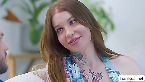 Tattooed slut sucks in a dick while she's getting a creampie