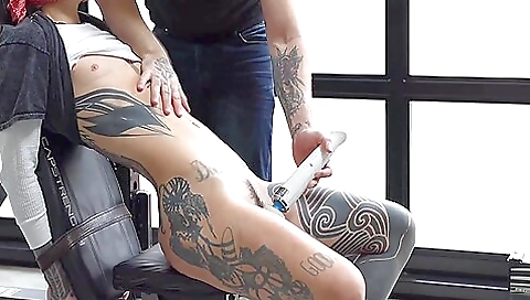 Tattooed woman getting bound and teased in the gym